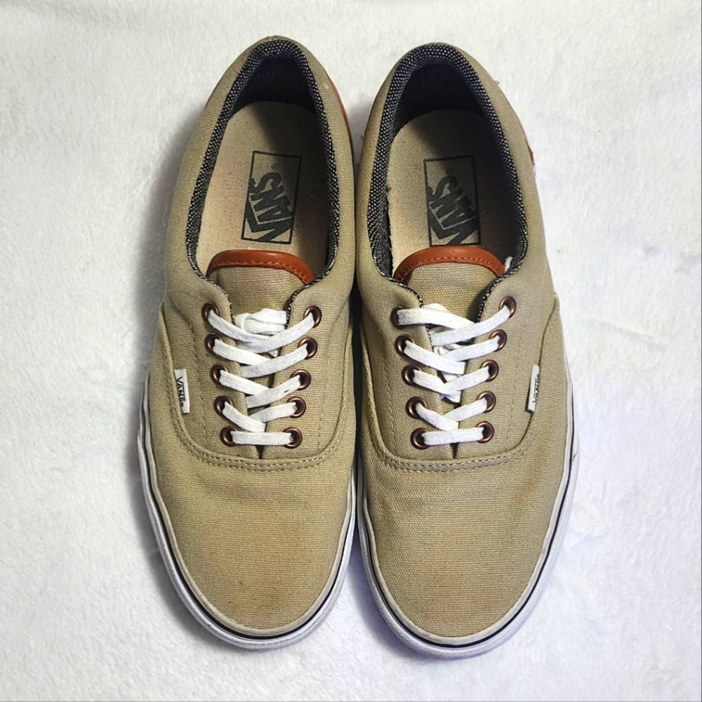 Tan and white Vans shoes